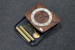 A mid 20th century Jungmans walnut wall clock with pendulum and weights