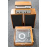 A mid 20th century teak cased Garrard turntable together with a pair of speakers,