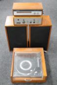 A mid 20th century teak cased Garrard turntable together with a pair of speakers,