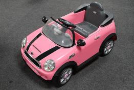 A child's electric Mini Convertible ride in car,