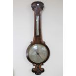 A Victorian rosewood based barometer with silvered dial