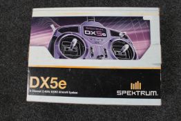 A boxed Spektrum DX5E five channel aircraft remote control