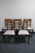 A drop leaf table and five Regency style dining chairs