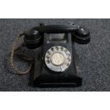 An early 20th century black Bakelite cased telephone