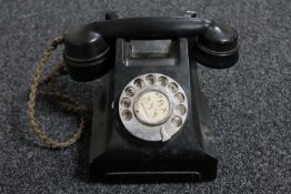 An early 20th century black Bakelite cased telephone