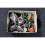 A collection of early car parts including lights, Lucas headlight with bulbs,