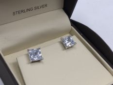 A pair of sterling silver stud earrings