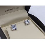 A pair of sterling silver stud earrings