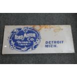 A reproduction enamelled metal sign 'Ford Motor Company Detroit,
