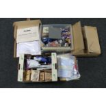 Four boxes of assorted crafting accessories, scrap book inserts,