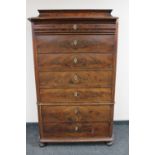 A 19th century continental mahogany seven drawer chest on chest