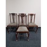 A set of four mahogany dining chairs