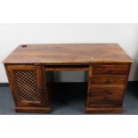 A sheesham wood twin pedestal desk