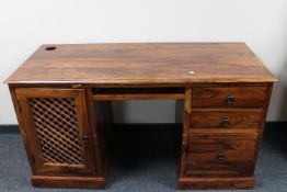 A sheesham wood twin pedestal desk