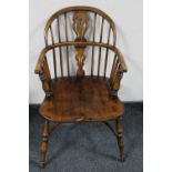 A 20th century beech Windsor armchair