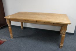 A pine farmhouse kitchen table