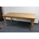 A pine farmhouse kitchen table