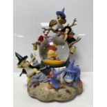 A Disney Winnie the Pooh & Friends musical light up revolving snow globe in original box