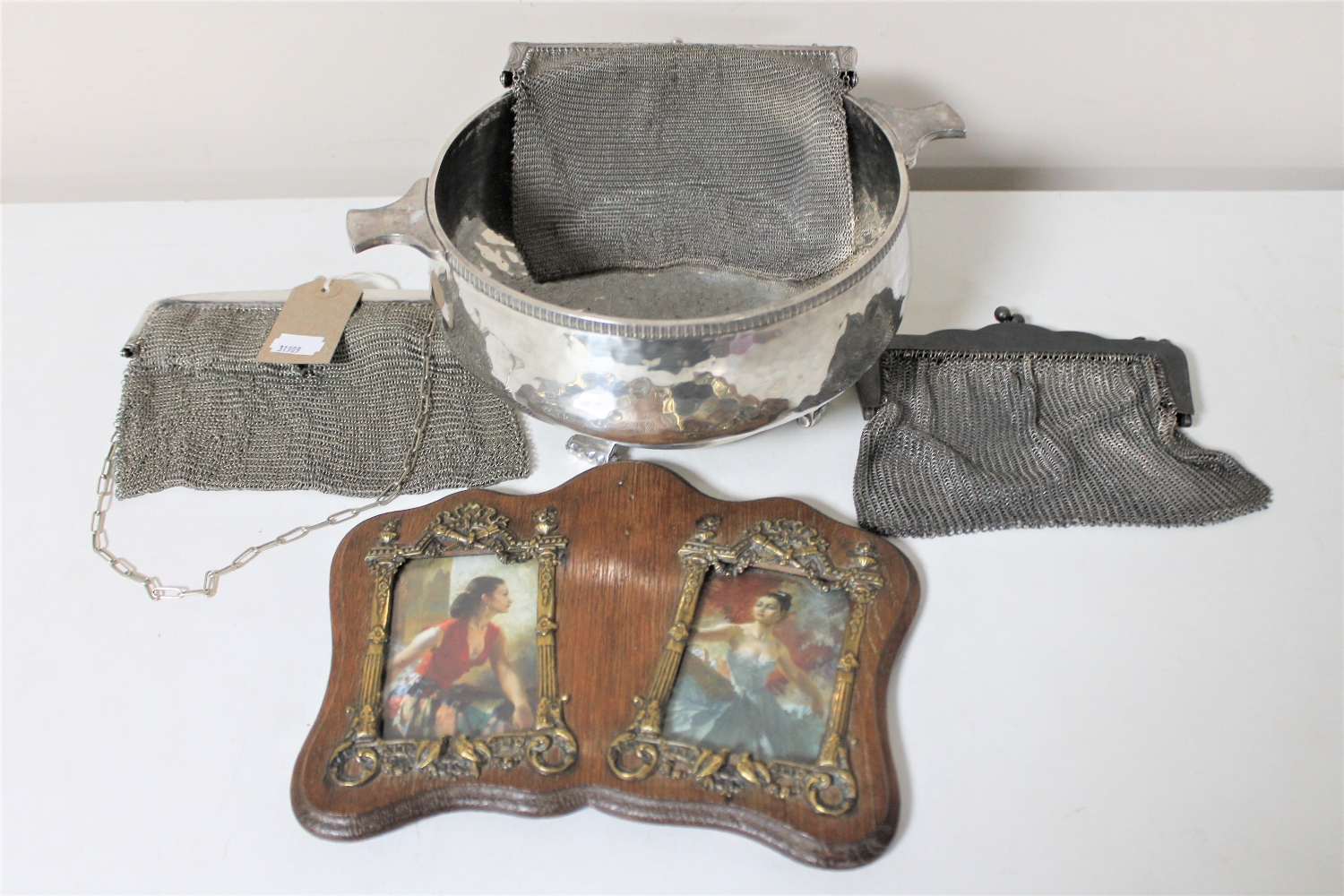 A silver plated Art Deco twin handled bowl together with a Victorian oak photo frame and three