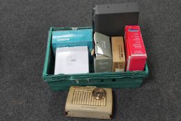 A box of Rhapsody Deluxe transistor radio, binatone telephone,