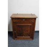 A 19th century mahogany cupboard fitted a drawer above