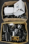 Two boxes of spot lights and sockets