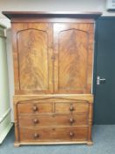 A Regency mahogany linen press,