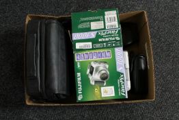 A box of Fujifilm camera, Minolta camera,