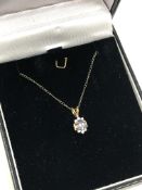 A 10ct gold tanzanite and diamond pendant on chain