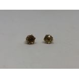 A pair of 9ct gold citrine earrings CONDITION REPORT: 1.6g.