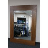 A large oak framed overmantel mirror