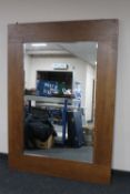 A large oak framed overmantel mirror