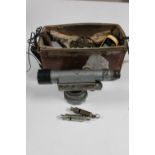 A leather cased theodolite,