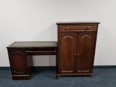 A continental style oak effect double door cabinet fitted a drawer together with a mahogany single