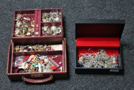 A jewellery box containing a large quantity of silver and costume jewellery, necklaces, cufflinks,