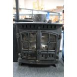 A Hunter Herald cast iron multi fuel stove