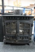 A Hunter Herald cast iron multi fuel stove