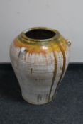 A large glazed pottery vase