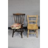 A spindle back kitchen chair and another chair