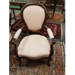 A pair of Victorian style mahogany salon chairs,