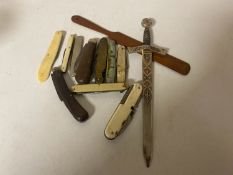 A group of antique and later pocket knives,