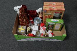 A box containing Christmas decorations and ornaments