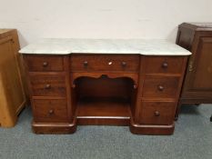 A Victorian mahogany wash stand with white marble top,