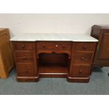 A Victorian mahogany wash stand with white marble top,