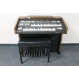 A Farfisa F450 two manual electric organ with stool