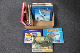 A box of hardback books relating to toys including The Great Book of Dinkys,