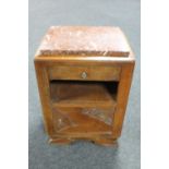 An Edwardian oak marble topped bedside cabinet