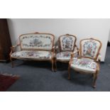 A three piece beech framed salon lounge suite in tapestry fabric