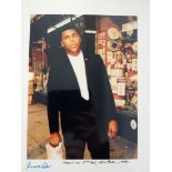 CINEMA, private colour photo of Muhammed Ali, half-length taken on 8th Avenue, New York (1977), 8