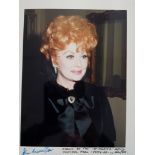 CINEMA, private colour photo of Lucille Ball, half-length taken at the St. Moritz Hotel Central